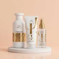 Set pentru par deteriorat Wella Professionals Oil Reflection ( Sampon 250 ml + Balsam 200 ml + Ulei Luminous Light 100 ml)